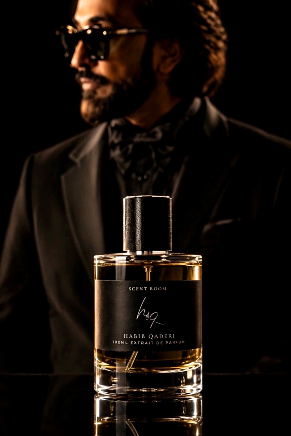 Habib Qaderi with the HQ fragrance bottle made by Scent Room in Sydney